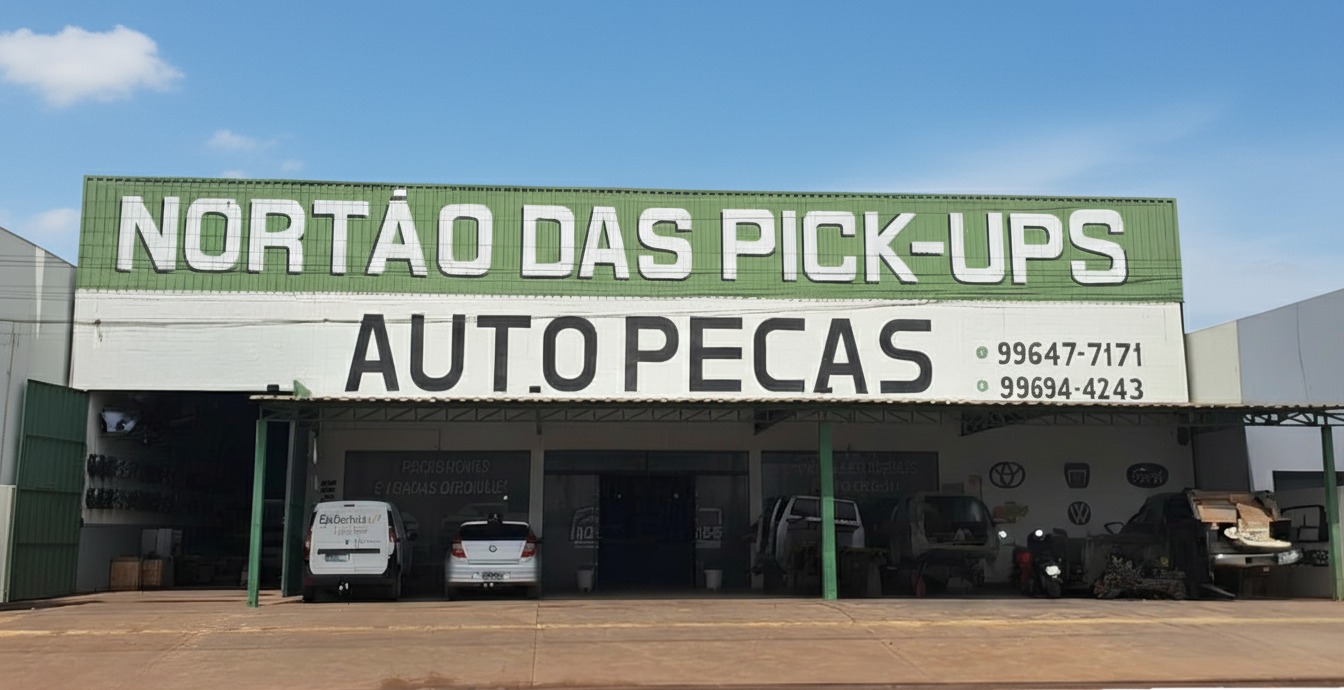 Fachada da Nortão das Pick-ups com letreiro "AUTO PEÇAS" na avenida